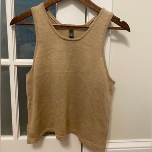 Tan colored tank top. Material is knitted.
